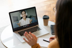 woman-having-business-meeting-online
