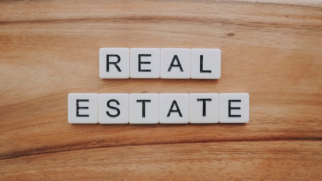 scrabble pieces laid out to spell real estate for can you put offers on multiple houses california